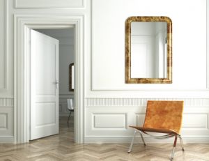 Fixer un miroir au mur
