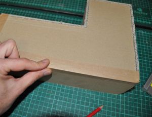 Poser le kraft gommé sur la lettre