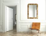 Fixer un miroir au mur